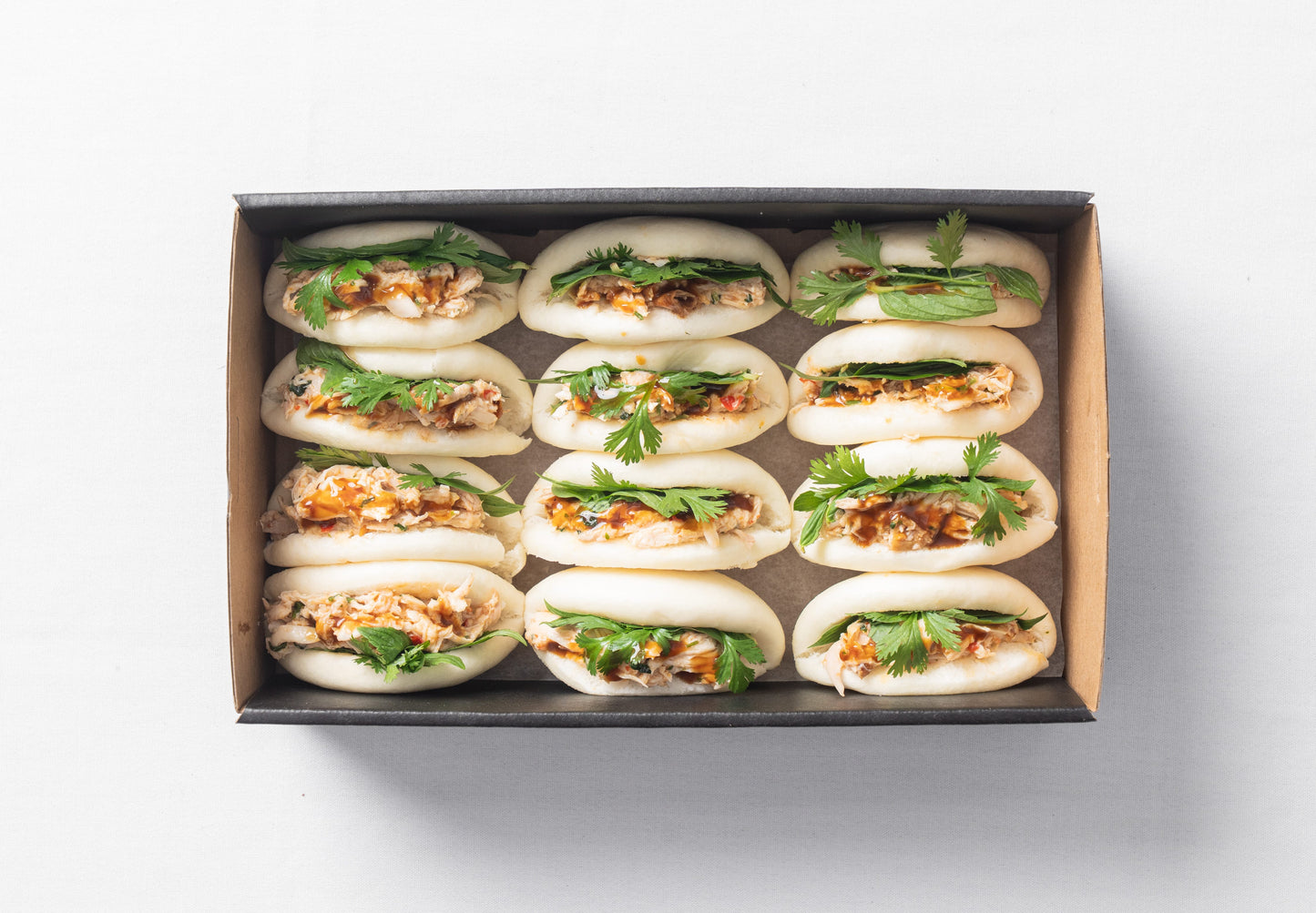 Lemongrass chicken, chilli & mint bao