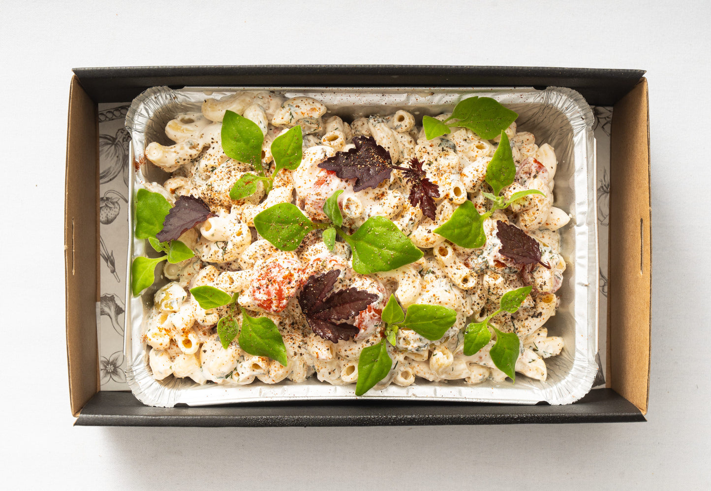 Pasta, cherry tomato, olives & herbed yogurt