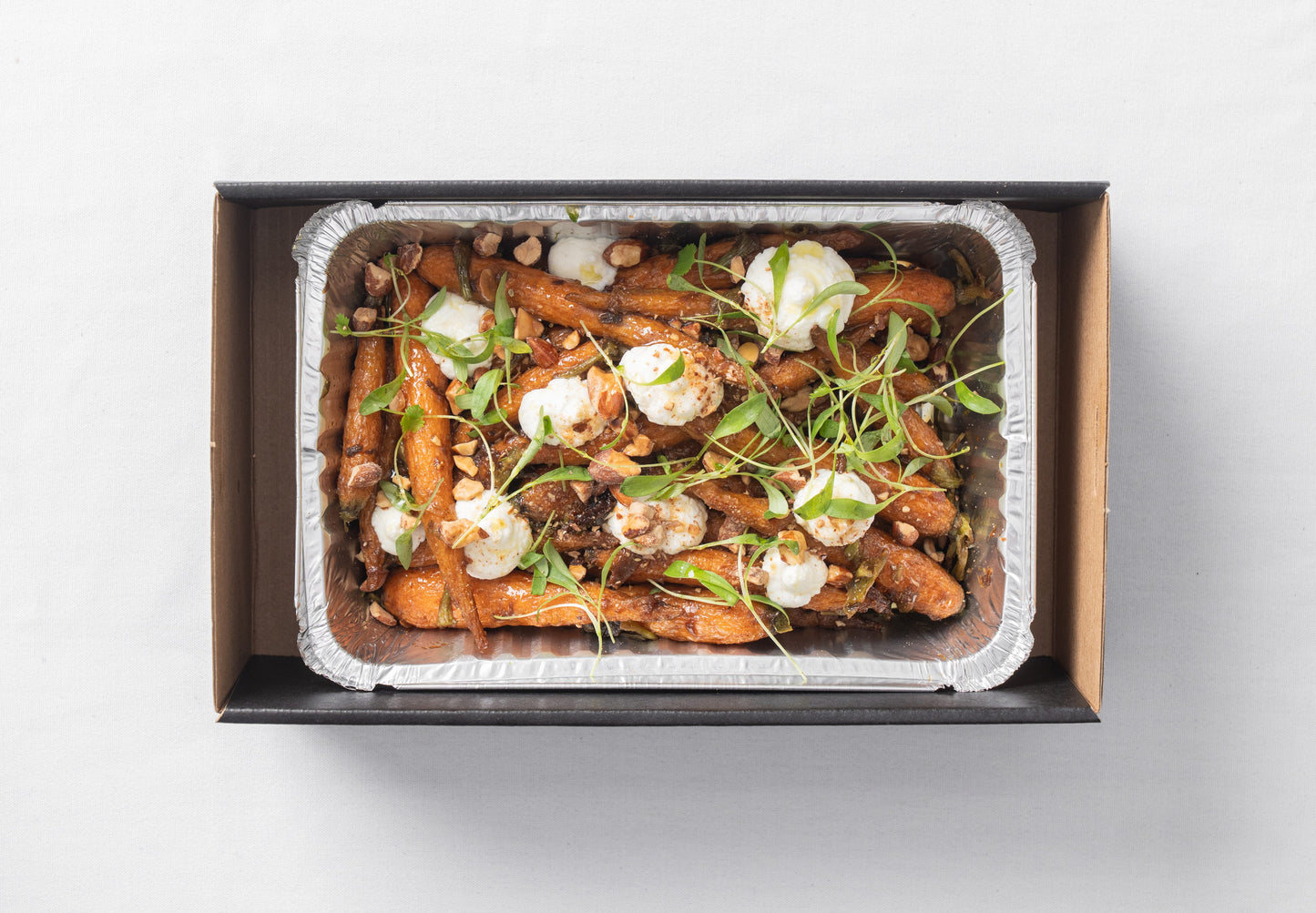 Roasted baby carrots, labneh & almonds