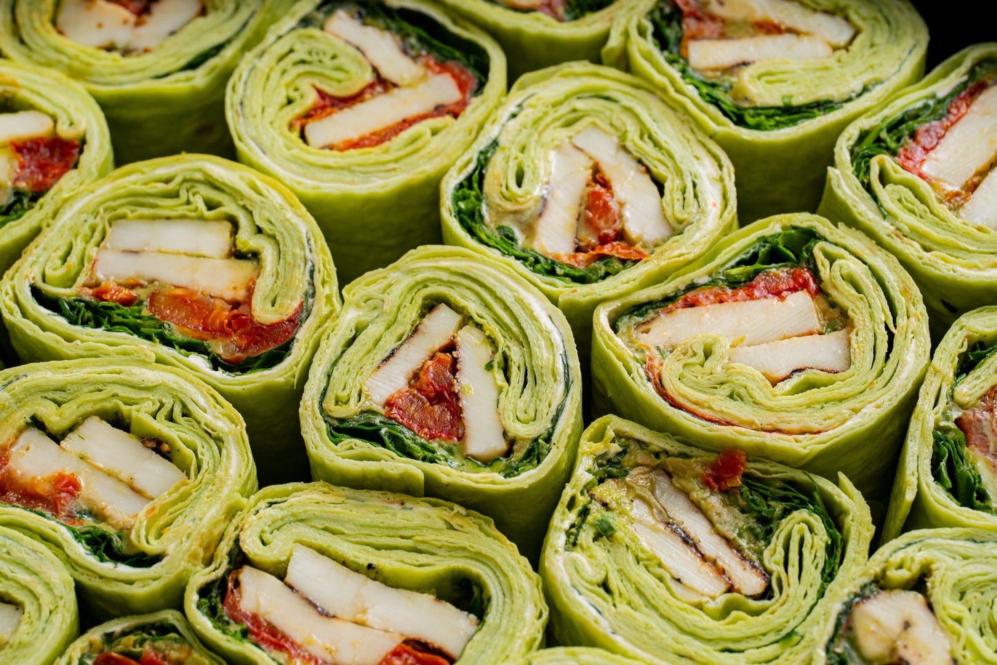 Grilled halloumi, avocado & zhoug wrap