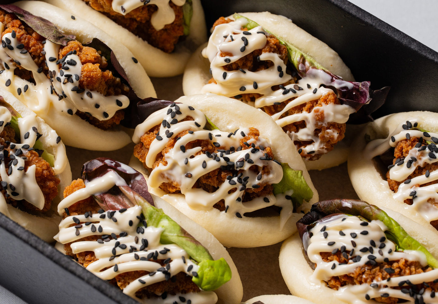 Karaage chicken, green oak lettuce & teriyaki sauce bao