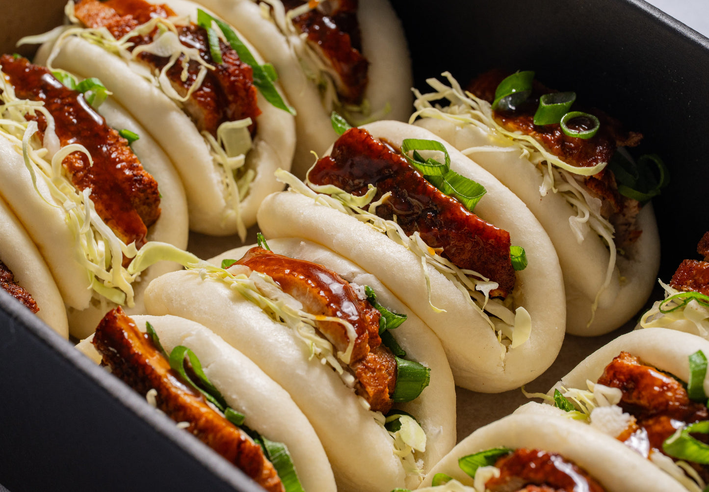 Peking duck, scallions & hoisin sauce bao