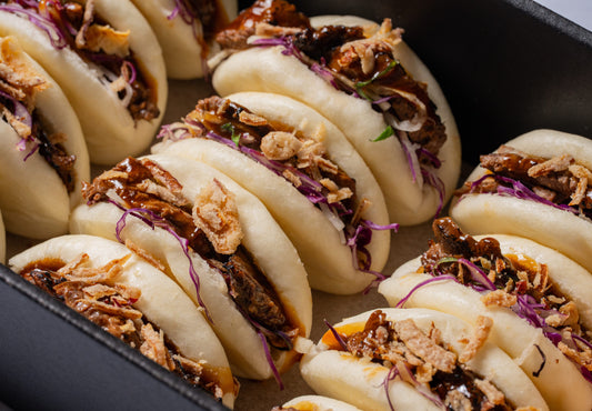 Sticky pork belly, shredded cabbage & coriander bao