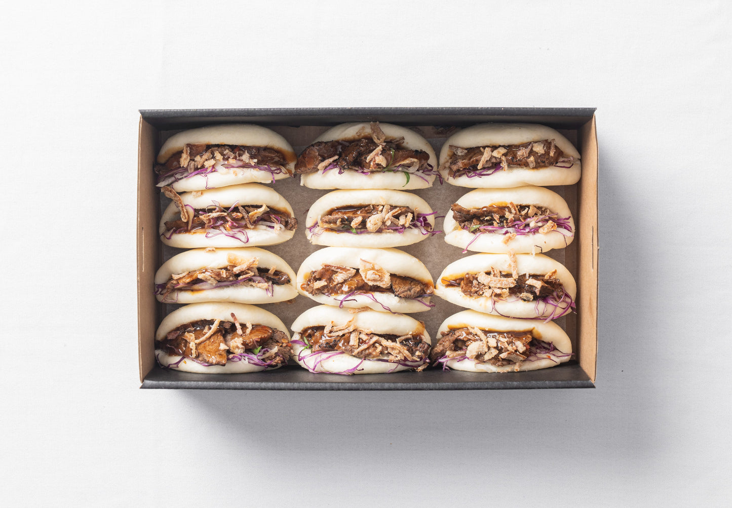 Sticky pork belly, shredded cabbage & coriander bao